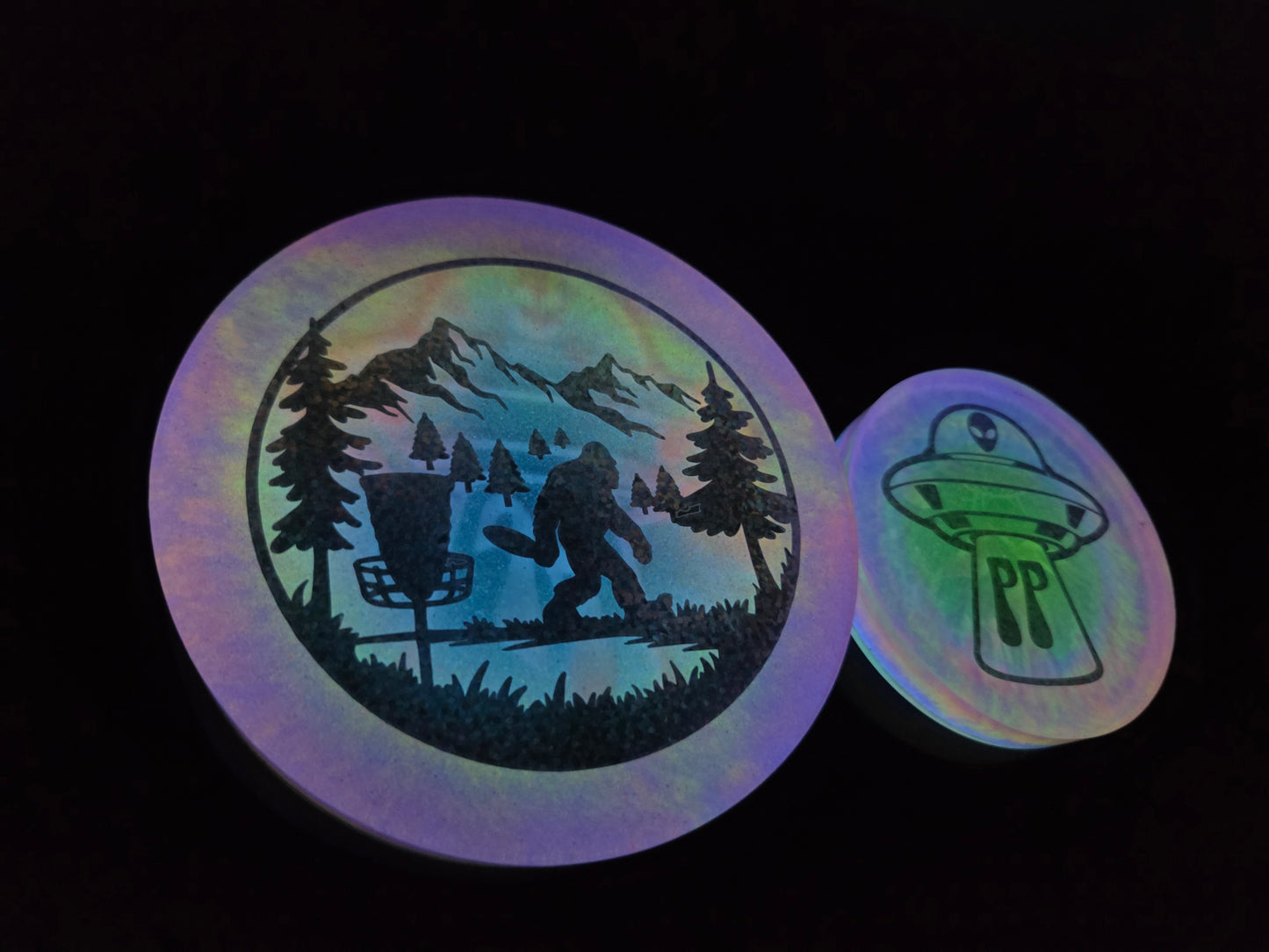 Poppycock UFO Weirder Thangz/Sasquatch Playing Disc Golf                              Poppycock UFO Strange Best Budz Double Sided Glow Mini Pack